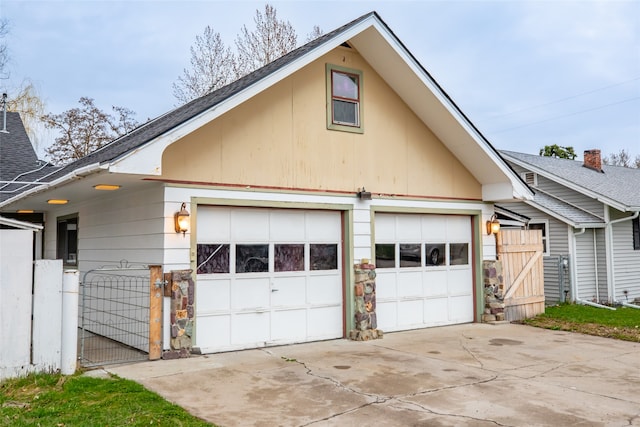 view of property exterior with a garage