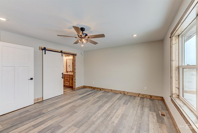 walk in closet with wood-type flooring