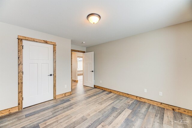 garage featuring a garage door opener and electric panel