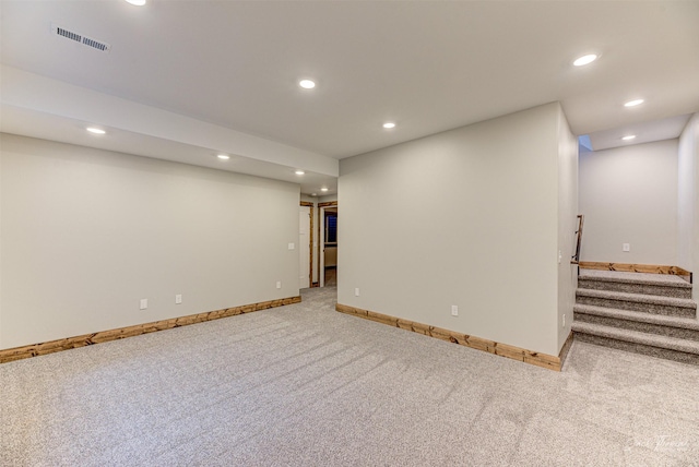 basement with light carpet