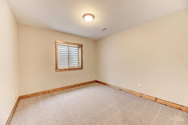 view of carpeted spare room