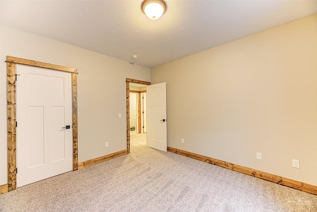 unfurnished bedroom with carpet