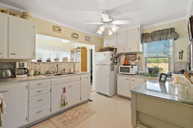 kitchen with sink, white cabinetry, white appliances, and ceiling fan