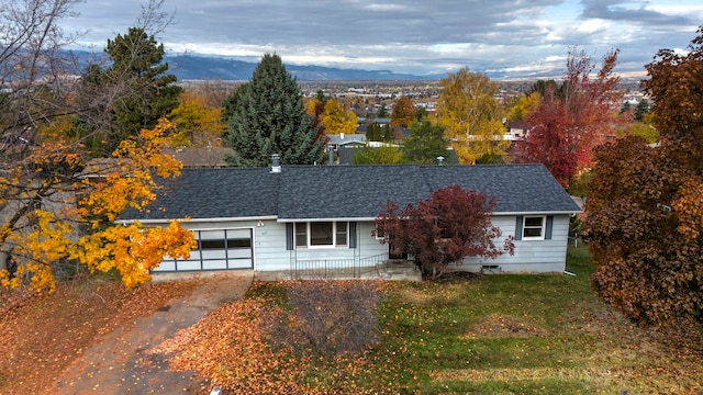 single story home with a mountain view