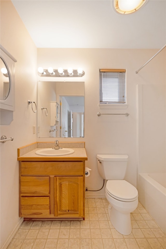 full bathroom with vanity, toilet, and shower / washtub combination