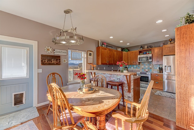 dining room featuring light hardwood / wood-style flooring