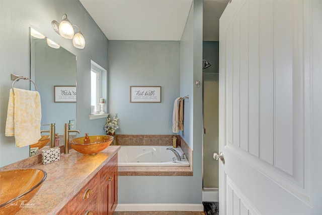 4349 Stoney Rd, Helena, MT 59602 - full bathroom with a whirlpool tub, double vanity, and walk in shower