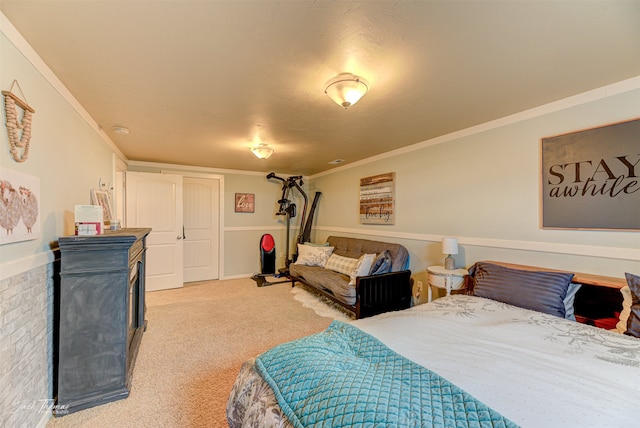 bedroom with light carpet and crown molding