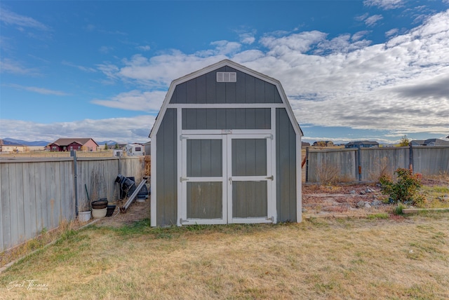 view of outdoor structure featuring a yard