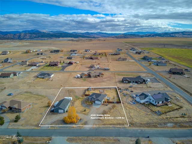 bird's eye view with a mountain view