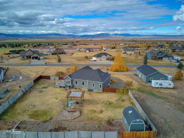 drone / aerial view featuring a mountain view