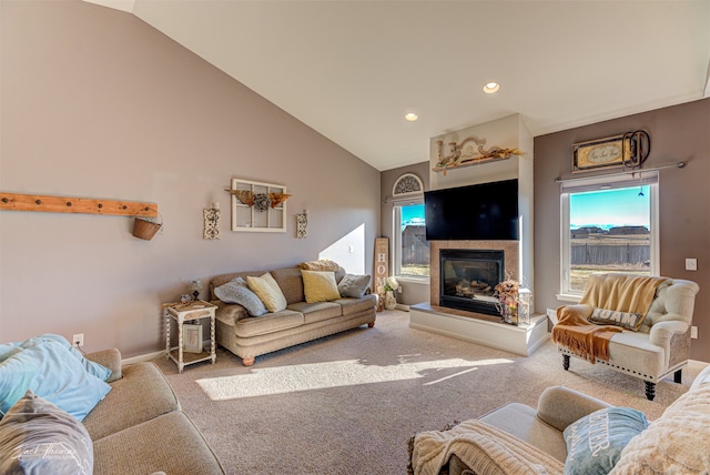 living room with carpet flooring and high vaulted ceiling