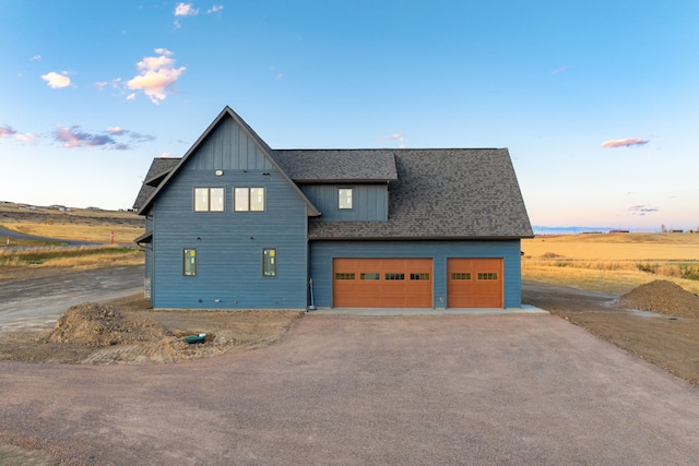 view of front of property featuring a garage