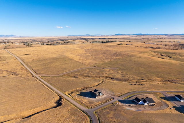 aerial view featuring a mountain view and a rural view