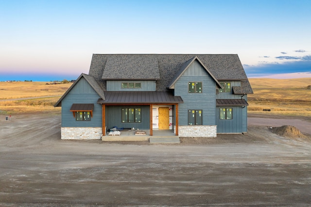 modern farmhouse featuring a porch