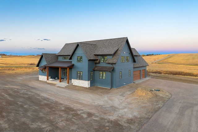 view of front of property featuring a garage