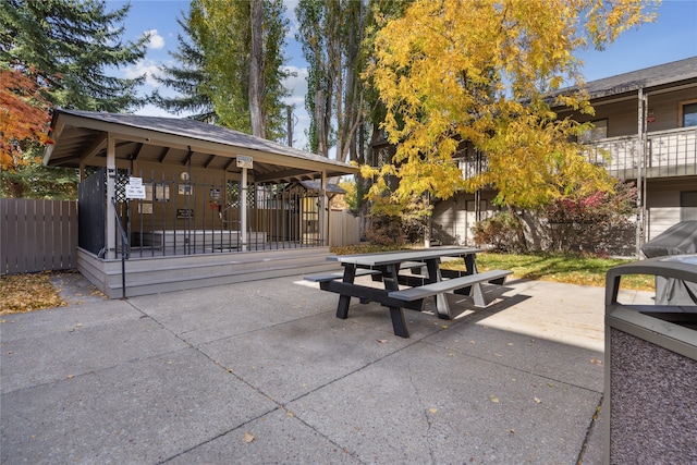 view of property's community with a patio