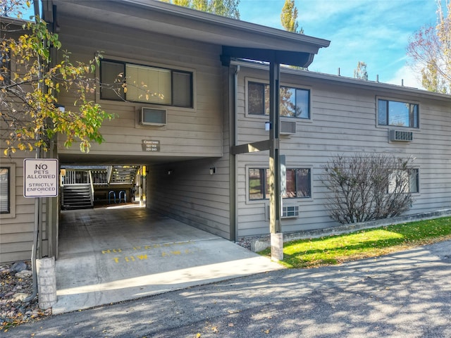 view of front of property with a carport