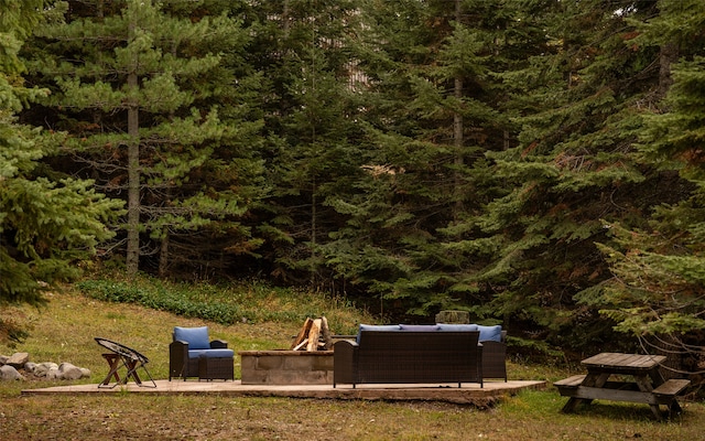 view of yard with a patio area and a fire pit