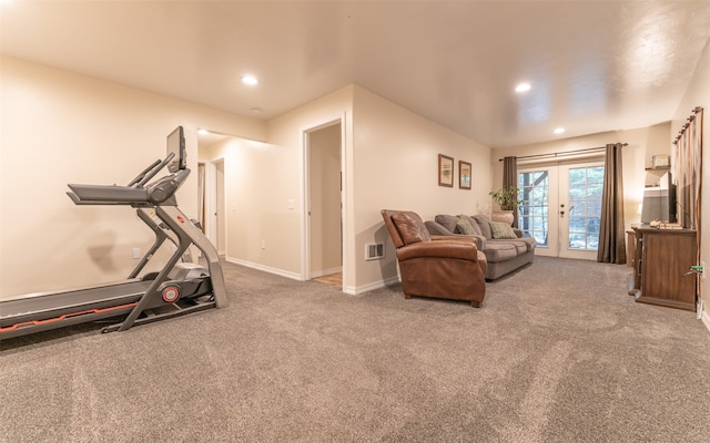 workout room with french doors and carpet floors