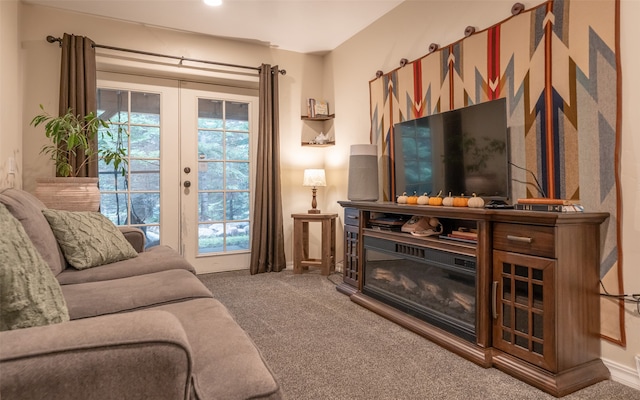 living room featuring carpet, french doors, and plenty of natural light