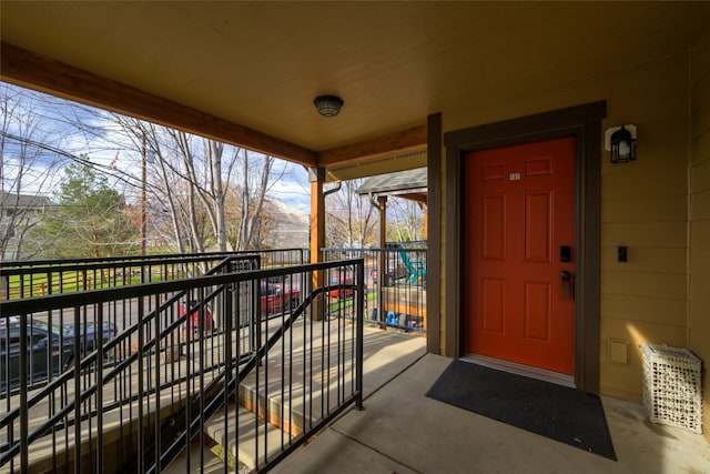 view of front of property with a balcony