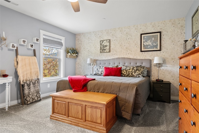 bedroom featuring light colored carpet and ceiling fan