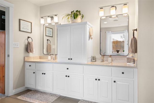 bathroom featuring vanity and wood-type flooring