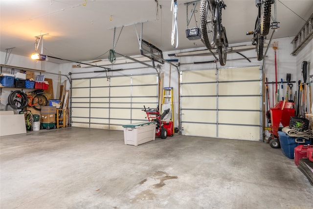 garage featuring a garage door opener