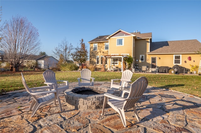 view of patio / terrace featuring a fire pit