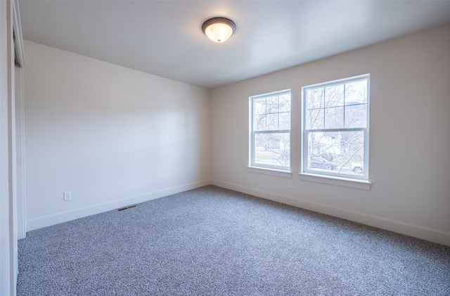 empty room featuring carpet