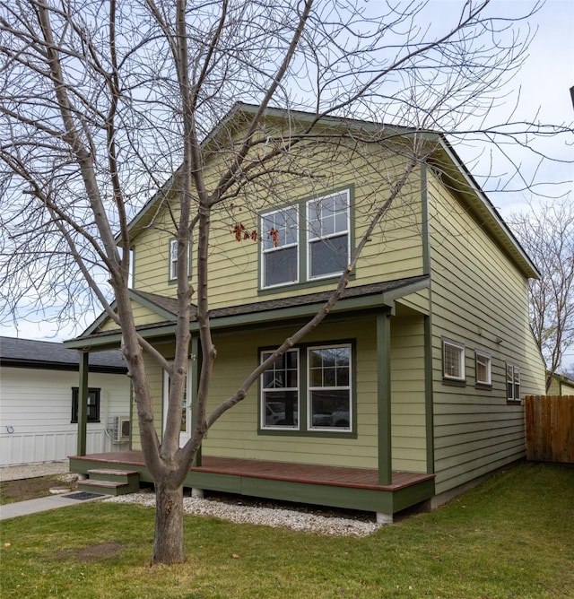 view of side of home featuring a yard