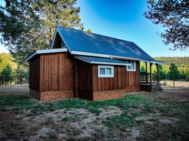 9330 US Highway 2 W, Marion, MT 59925 - view of side of property featuring metal roof and board and batten siding