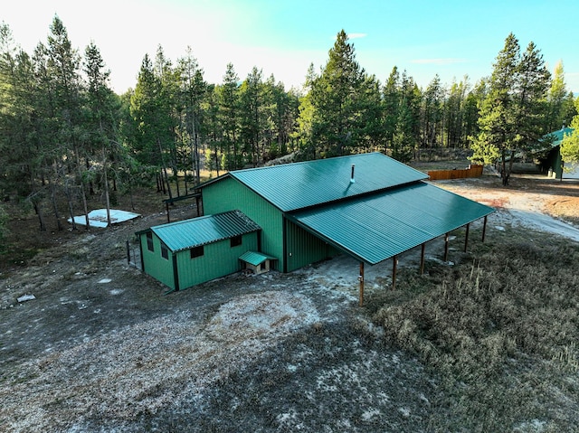 9330 US Highway 2 W, Marion, MT 59925 - view of side of home featuring metal roof