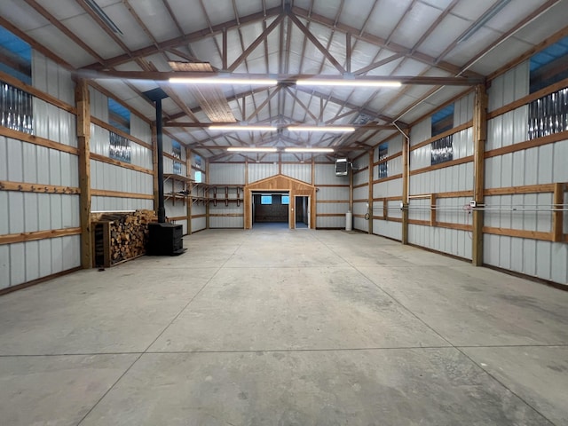 9330 US Highway 2 W, Marion, MT 59925 - garage with a wood stove and metal wall