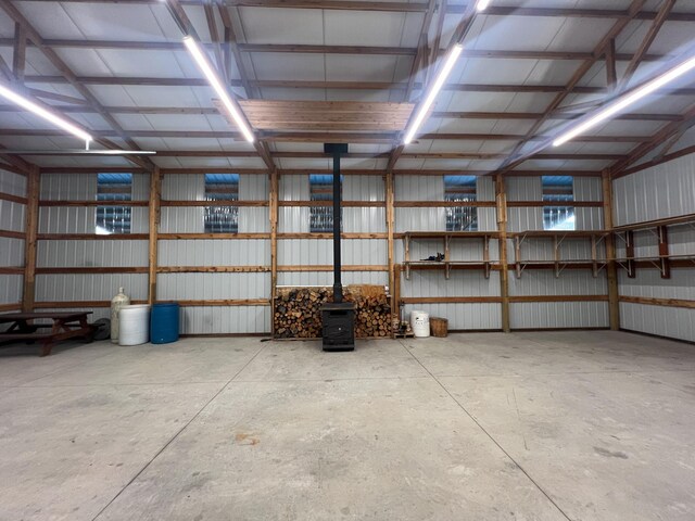 9330 US Highway 2 W, Marion, MT 59925 - garage with metal wall and a wood stove