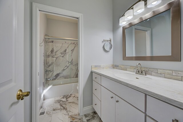 full bathroom featuring vanity, shower / bathing tub combination, and toilet