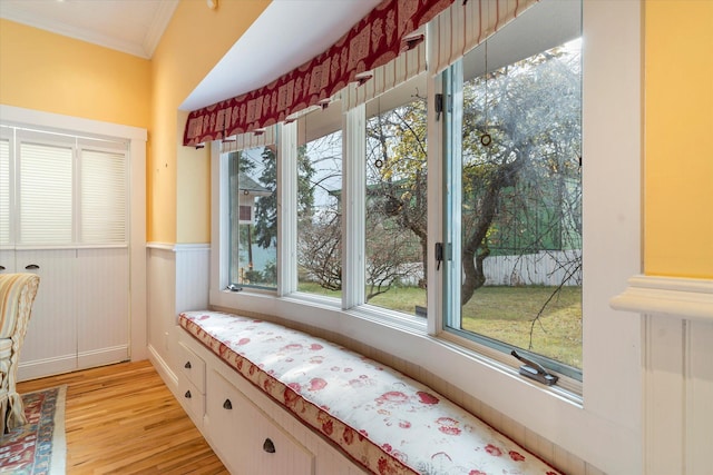 381 Lakeside Blvd, Lakeside, MT 59922 - dining space featuring crown molding, light wood-type flooring, and wainscoting