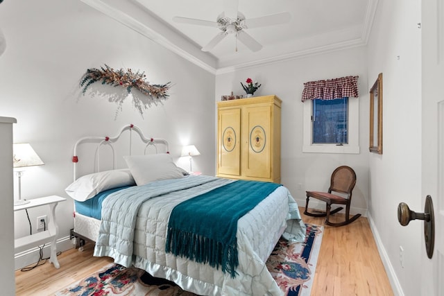 381 Lakeside Blvd, Lakeside, MT 59922 - bedroom with light wood-type flooring, crown molding, and ceiling fan