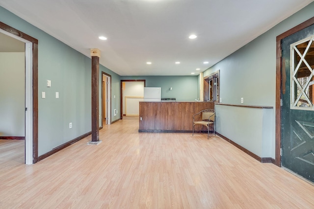 1750 Hill Meadows Rd, Whitefish, MT 59937 - bar with baseboards, light wood-style flooring, recessed lighting, and freestanding refrigerator