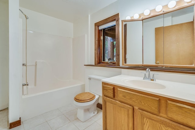 1750 Hill Meadows Rd, Whitefish, MT 59937 - bathroom featuring tile patterned flooring, toilet, vanity, and washtub / shower combination