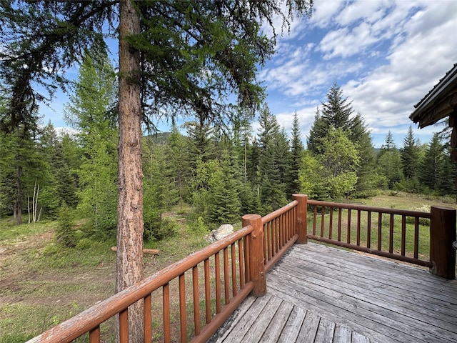1750 Hill Meadows Rd, Whitefish, MT 59937 - deck featuring a forest view