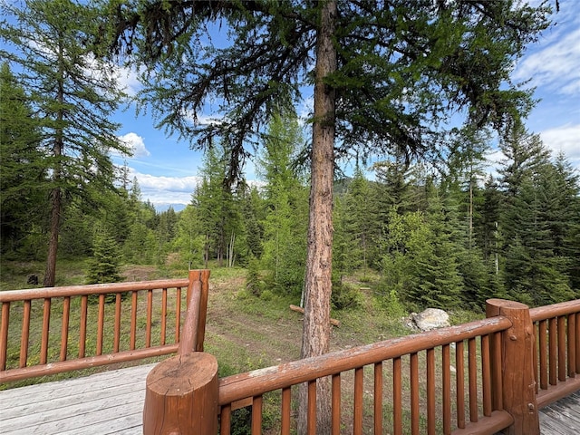 1750 Hill Meadows Rd, Whitefish, MT 59937 - deck with a forest view
