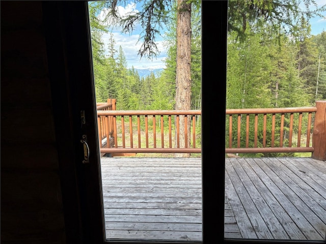 1750 Hill Meadows Rd, Whitefish, MT 59937 - deck featuring a view of trees