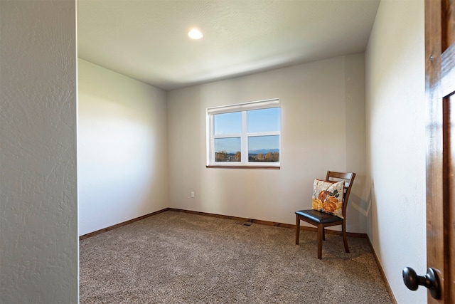 unfurnished room featuring carpet floors