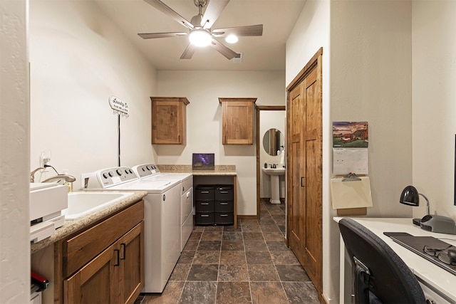 laundry room with sink, independent washer and dryer, and ceiling fan