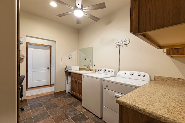 washroom with cabinets, sink, separate washer and dryer, and ceiling fan