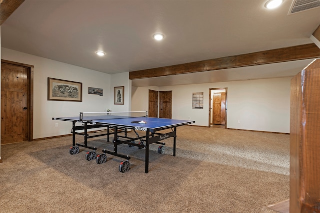 playroom with carpet floors and beam ceiling