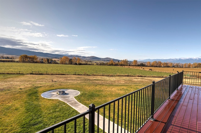 exterior space with a rural view and a mountain view