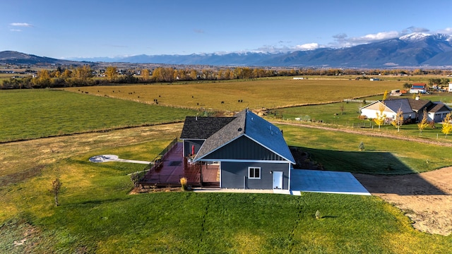 aerial view featuring a rural view and a mountain view